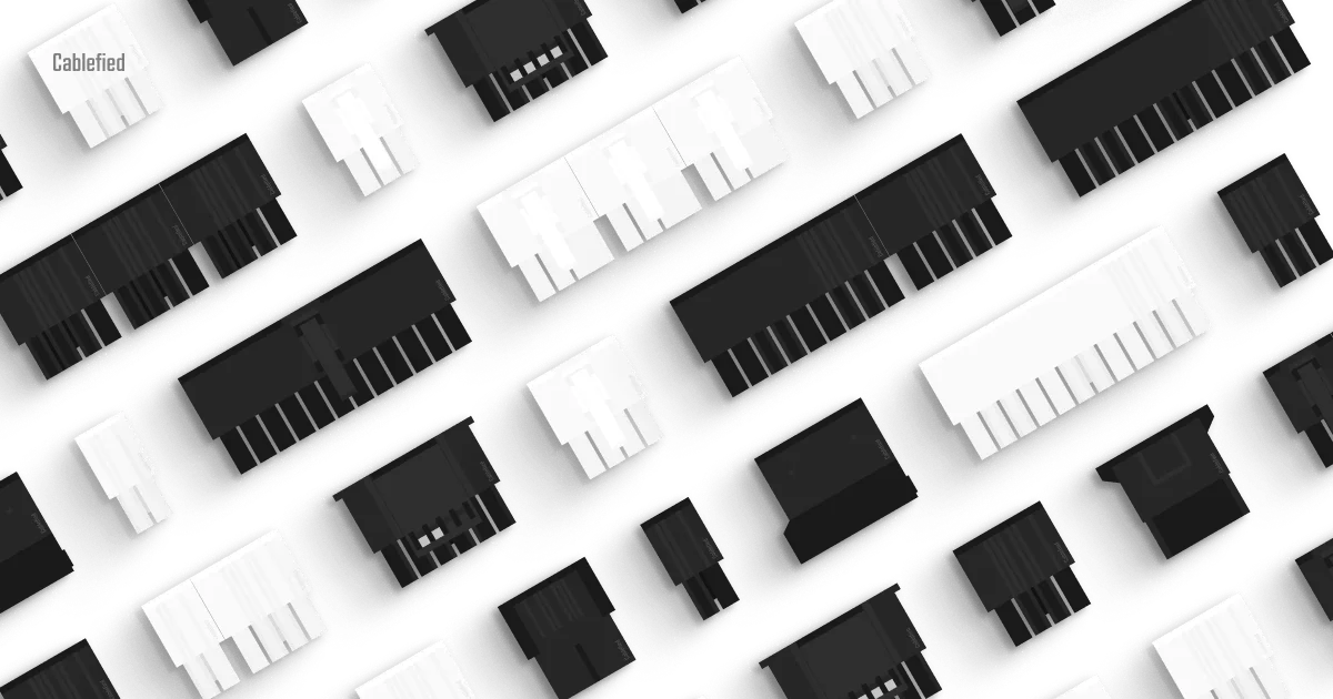 Black and white PC cable connectors in a diagonal layout such as 24 pin ATX, 8 pin PCIe, and 8 pin EPS connectors.